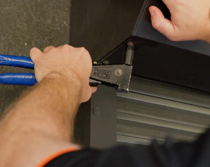 close up of security shutters being installed